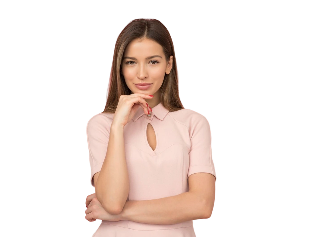 Woman with long brown hair in a pale pink collared blouse after