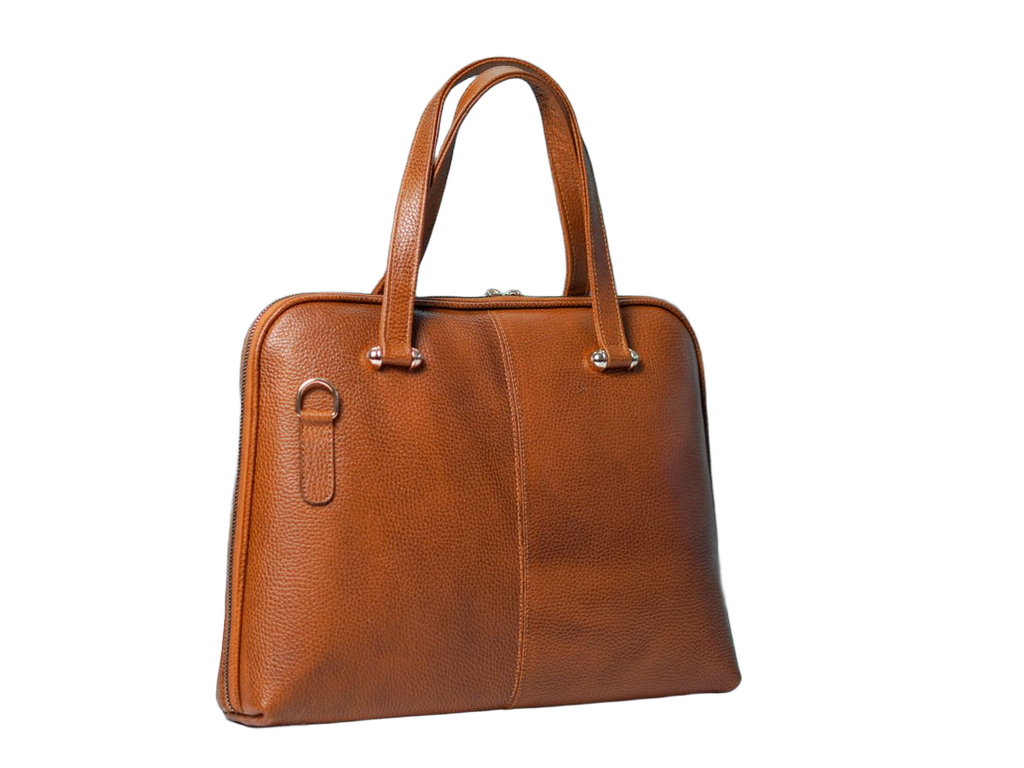 Leather handbag on a white background after